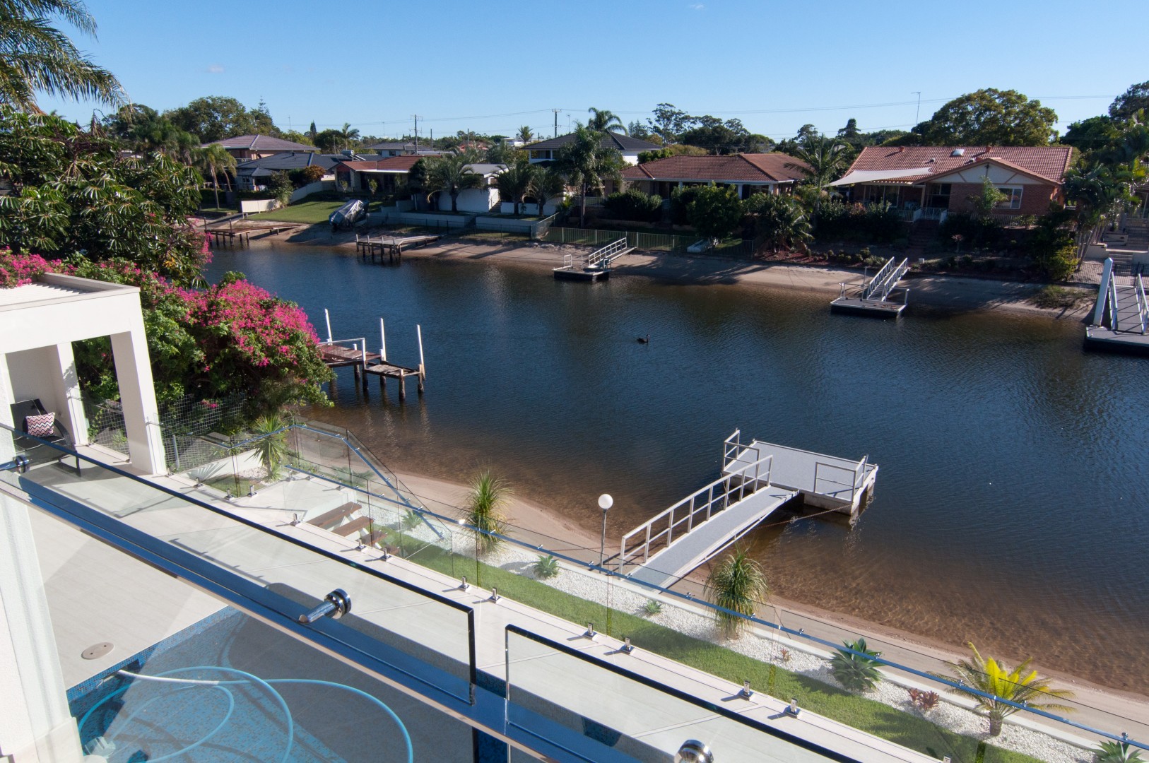 Canal frontage house by "PILLAR CONSULTING " PTY LTD" Architizer