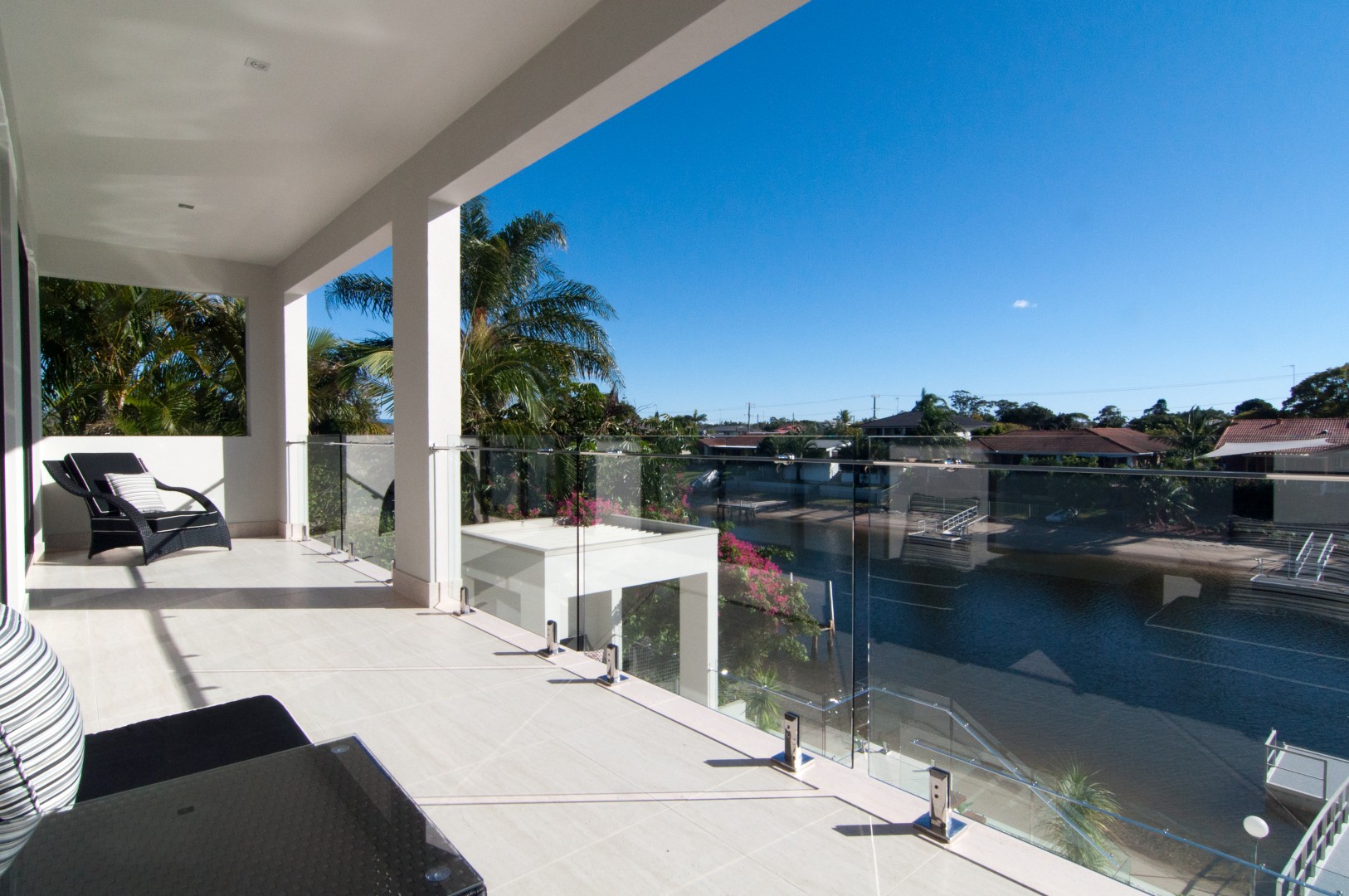 Canal frontage house by "PILLAR CONSULTING " PTY LTD" Architizer