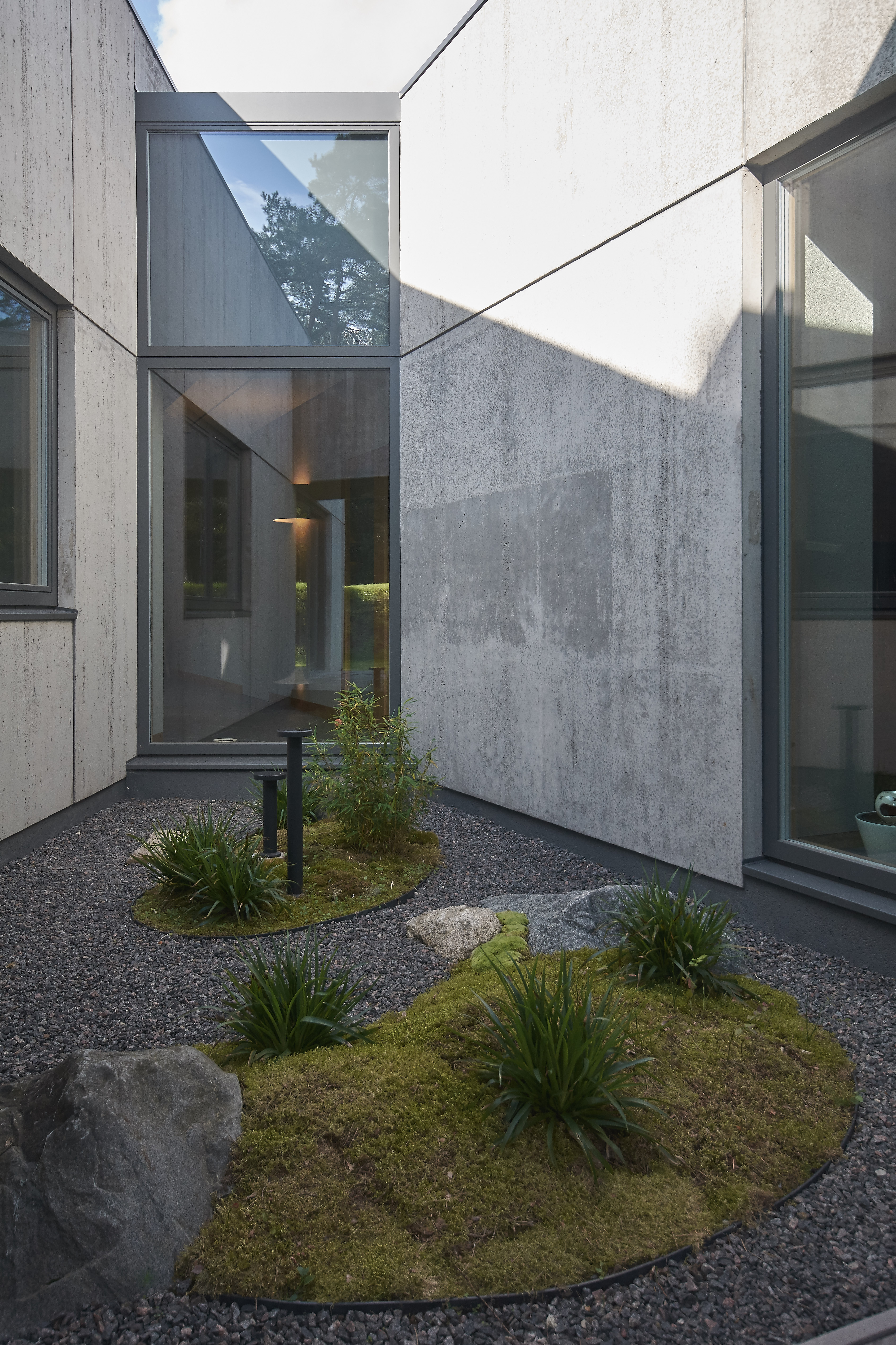 Residential Minimalist Concrete House by NEBRAU - Architizer