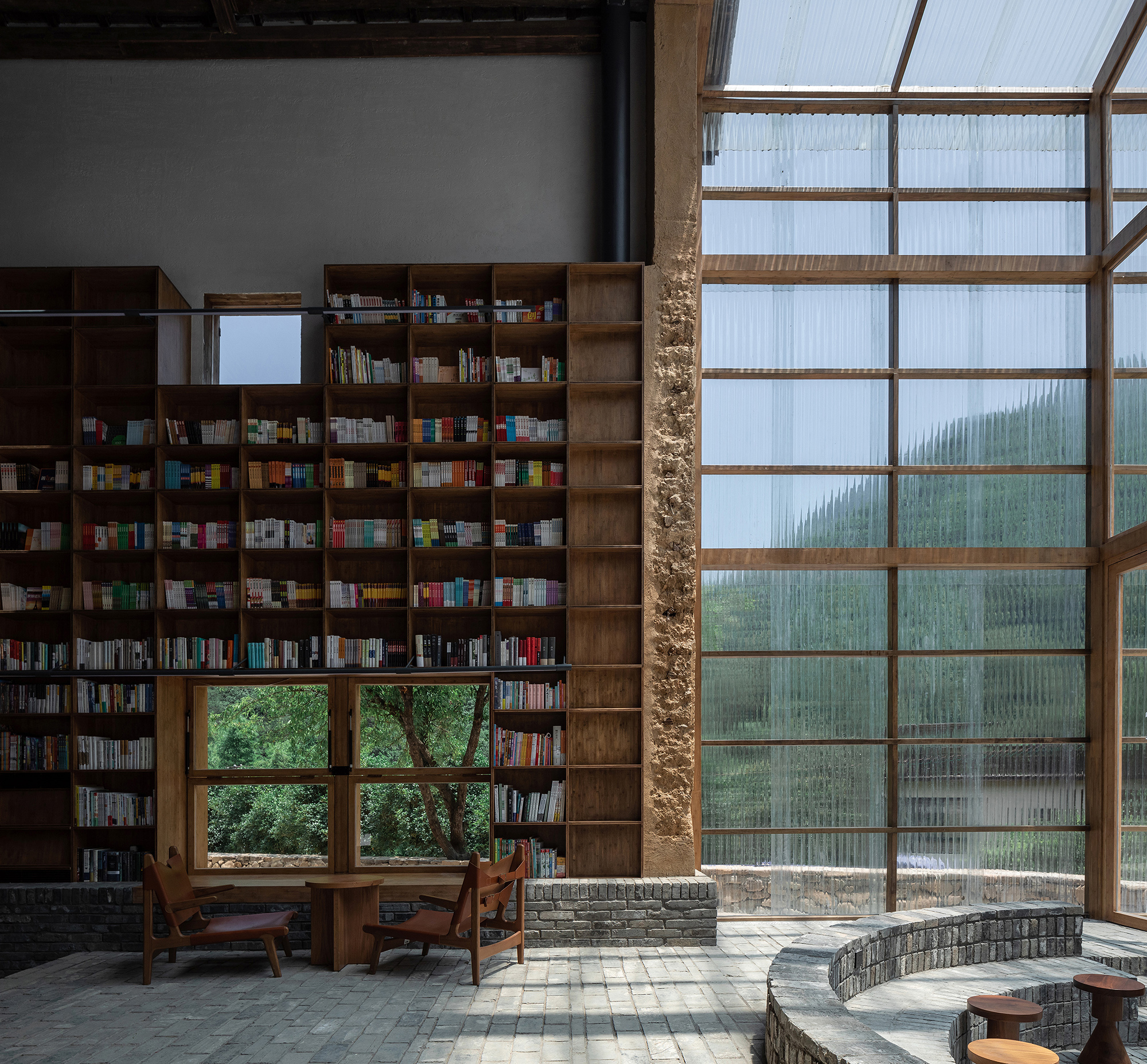 Capsule hotel in a rural library by Atelier tao+c - Architizer