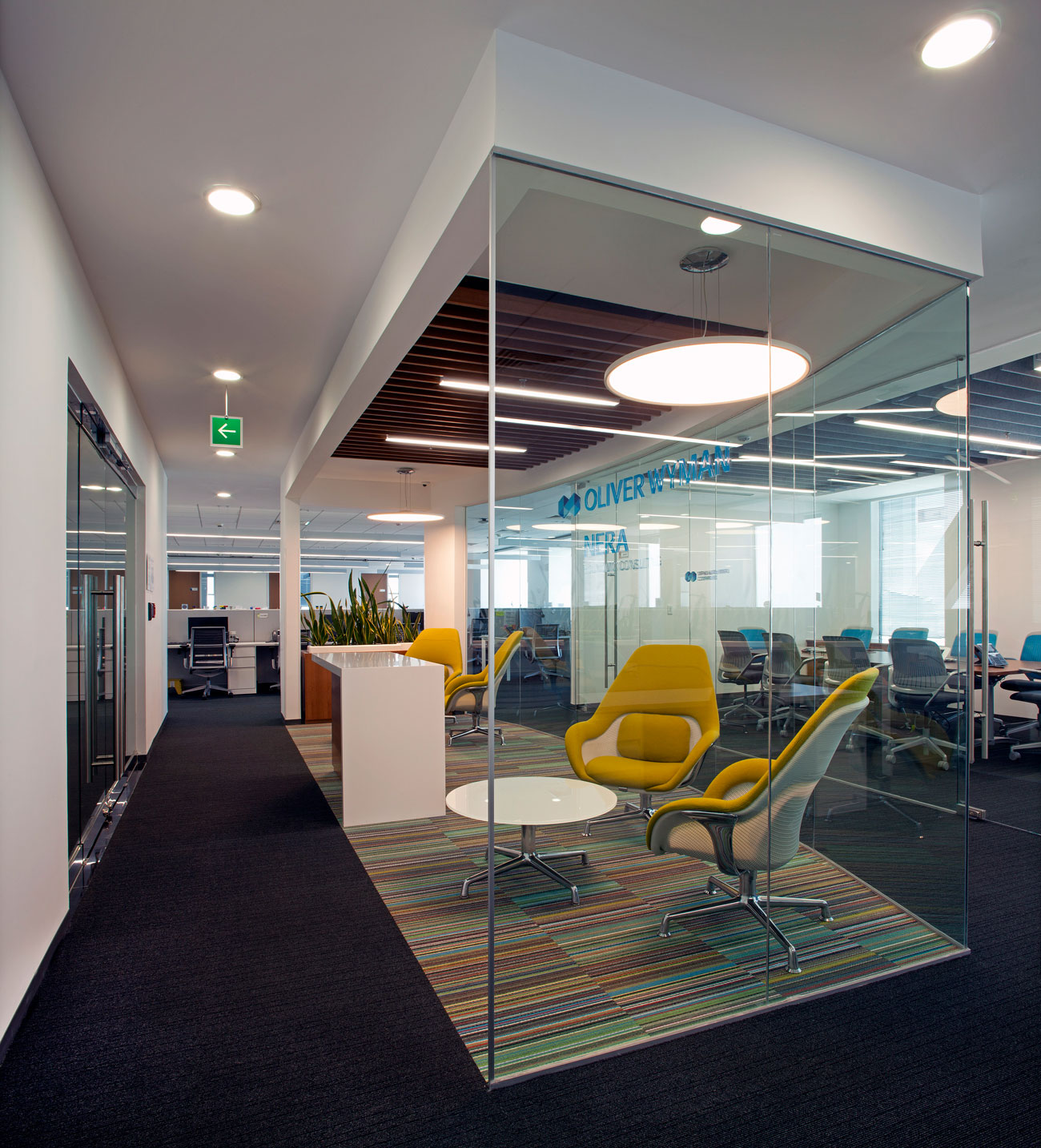 Oliver Wyman / Marsh & McLennan Companies by SPS+Sinapsis - Architizer