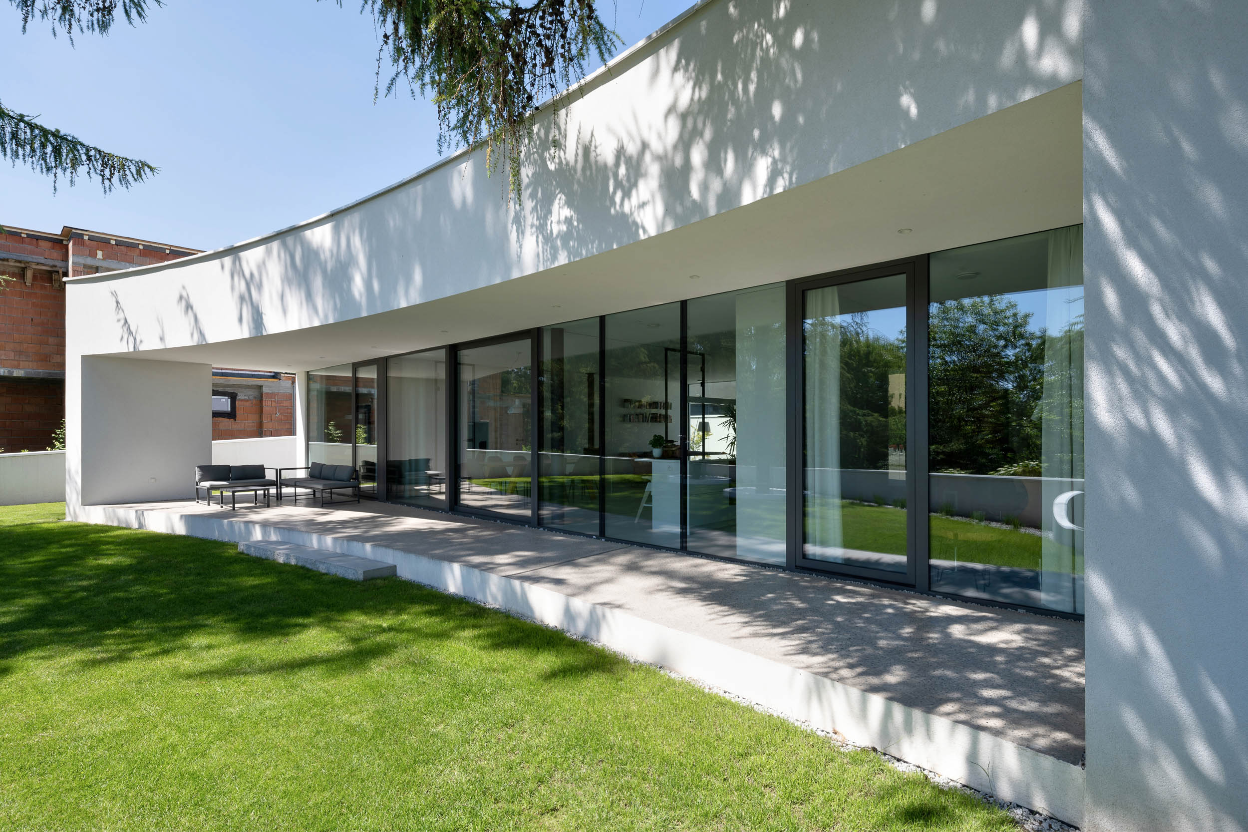 House at the junction by TTAT - Architizer