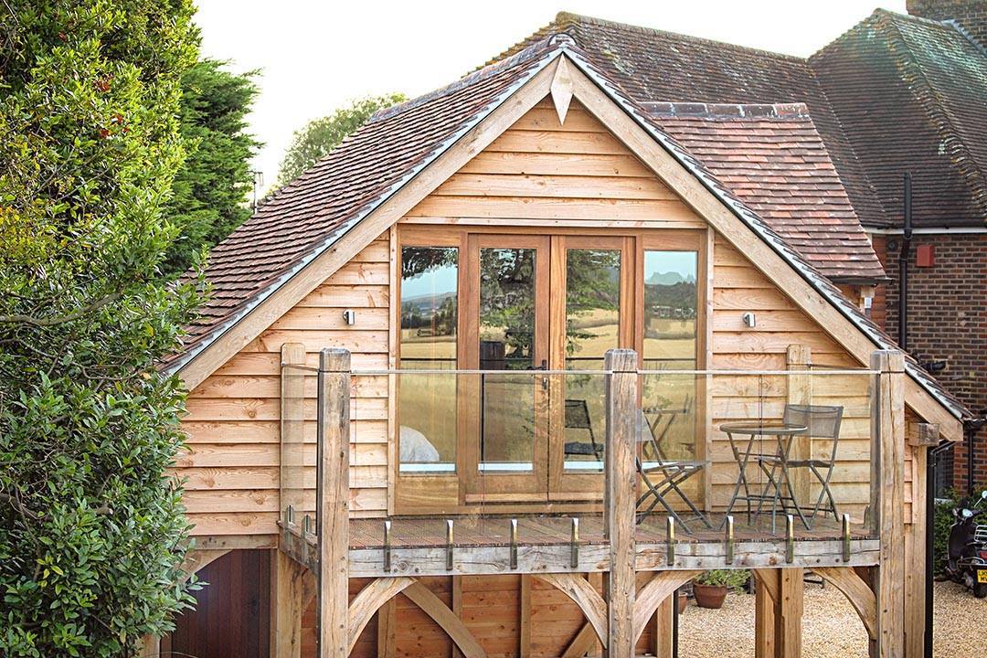 2 Bay Oak Carport With Room Above & Balcony by The Classic Barn Company ...