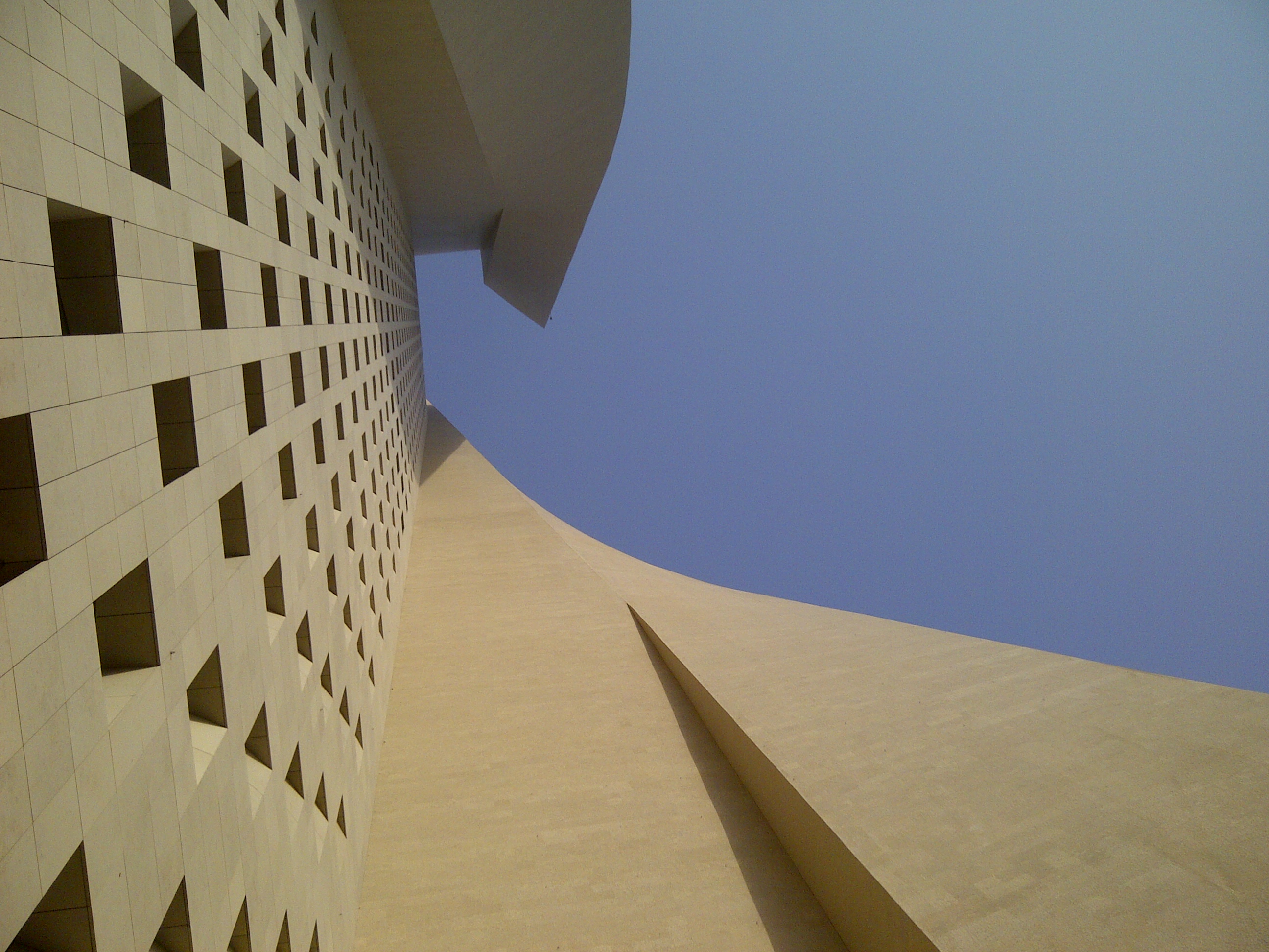 Al Hamra Tower by Skidmore, Owings & Merrill (SOM) - Architizer