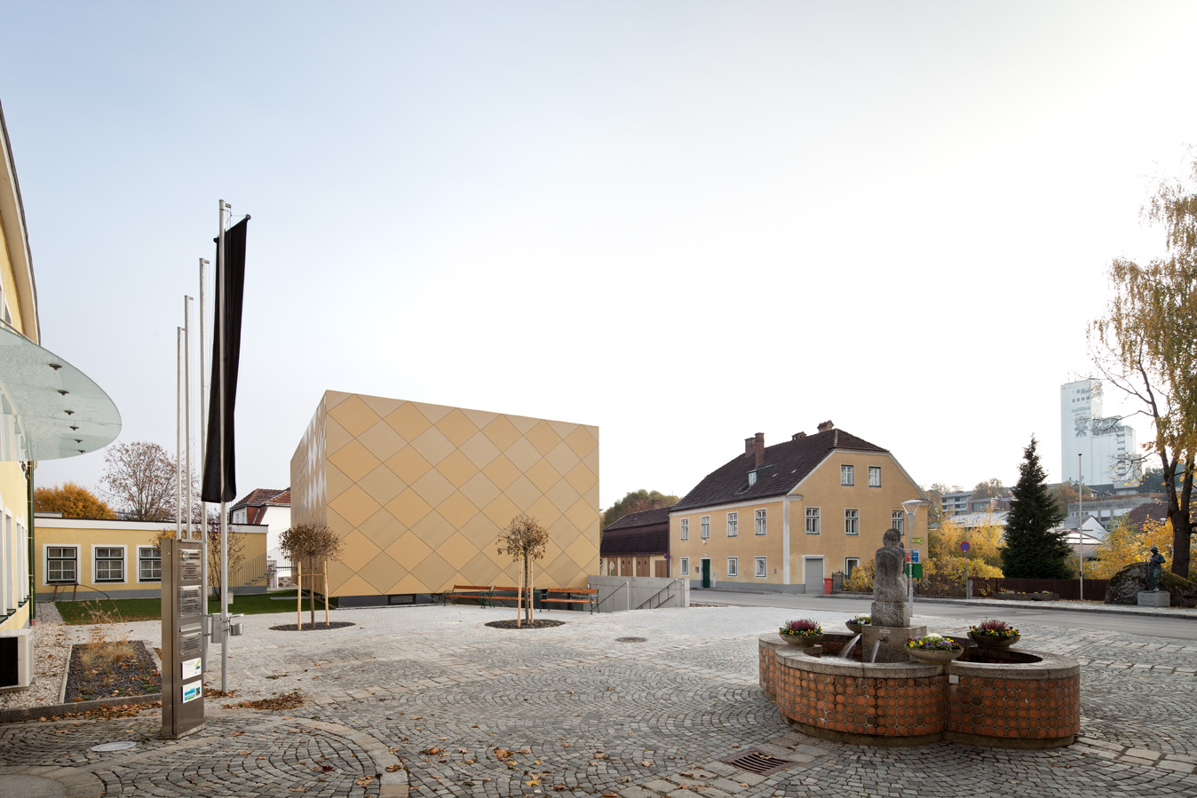 Gold outside, brass inside - Musikverein Zwettl by Franz&Sue - Architizer