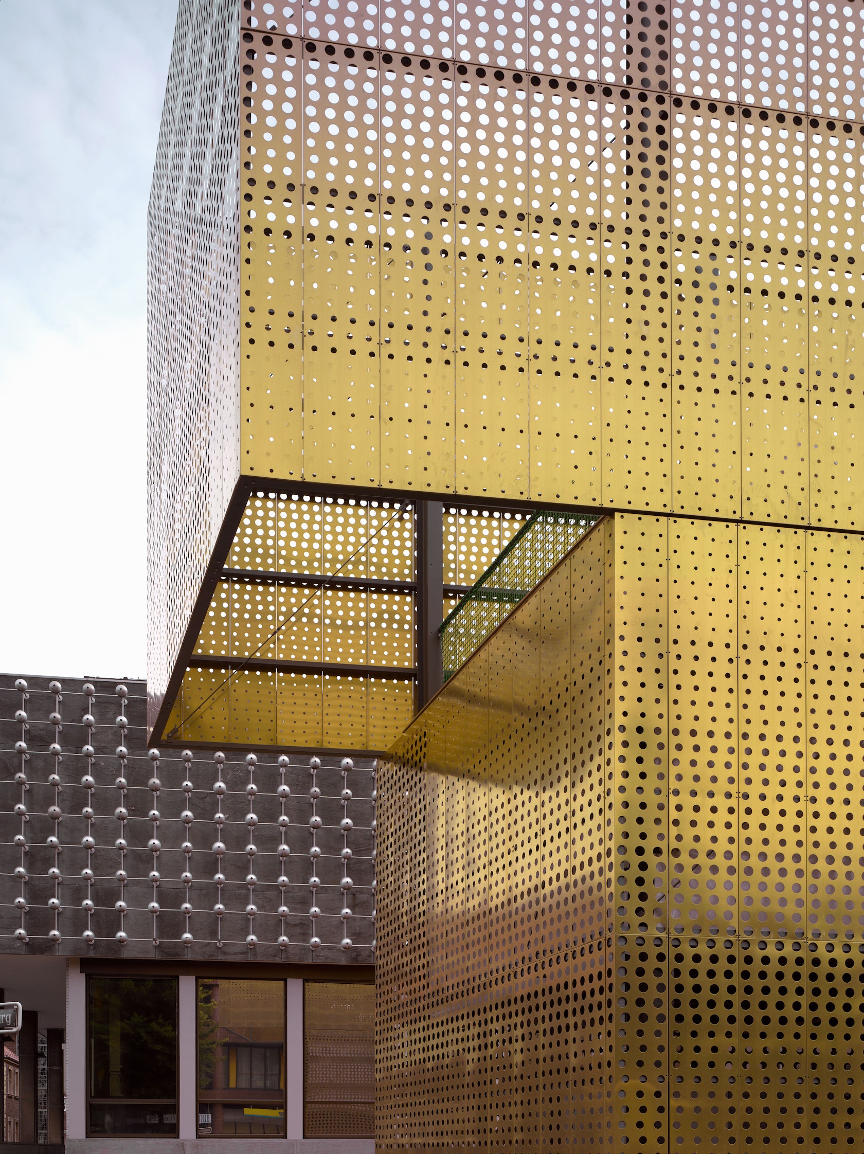 Gallery of Translucent, Breathable Facades: 8 Tips for Incorporating Metal  Meshes into Your Building - 15