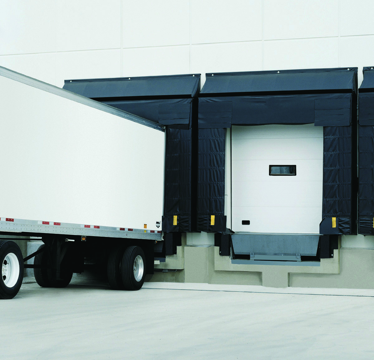 Raynor ThermaSeal - Commerical Sectional Pan Garage Doors 