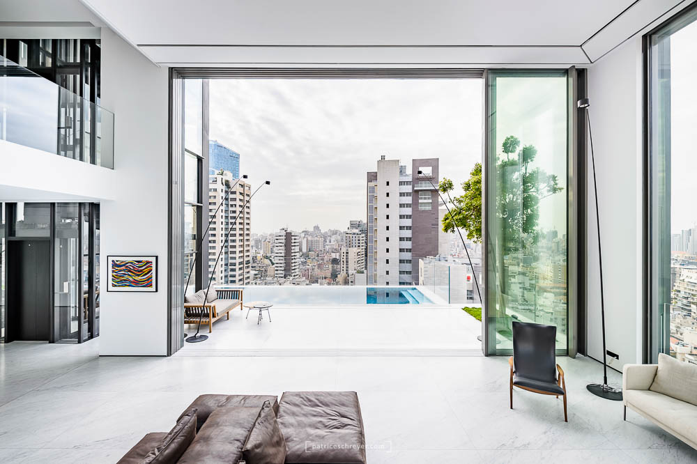 20I30 Penthouse by Raed Abillama Architects, Beirut, Lebanon, featuring Vitrocsa glass windows
