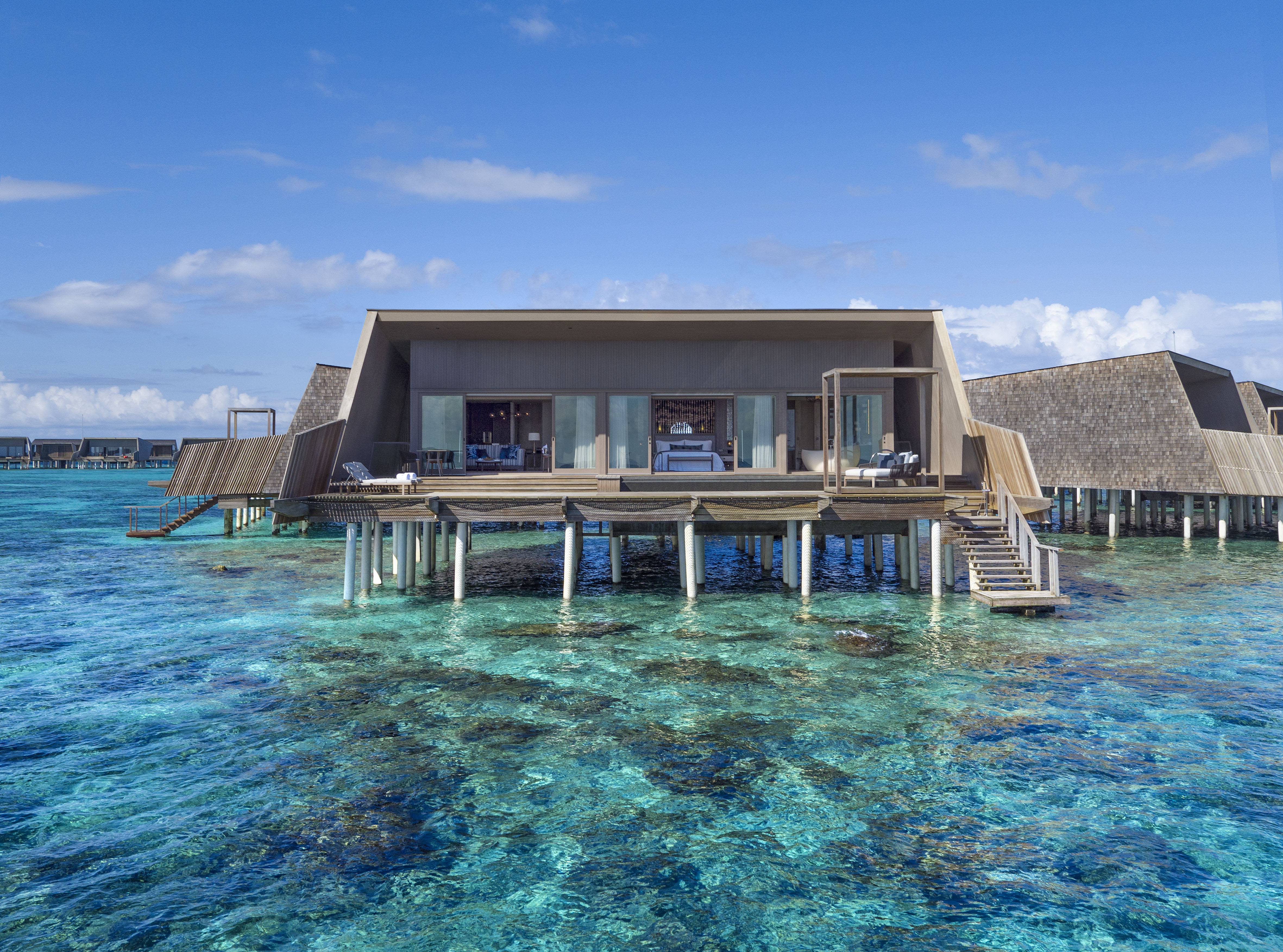 Домики на воде. Мальдивы St Regis Maldives. Мальдивы Атолл домики. Даалу Атолл Мальдивы. Бунгало на Мальдивах.