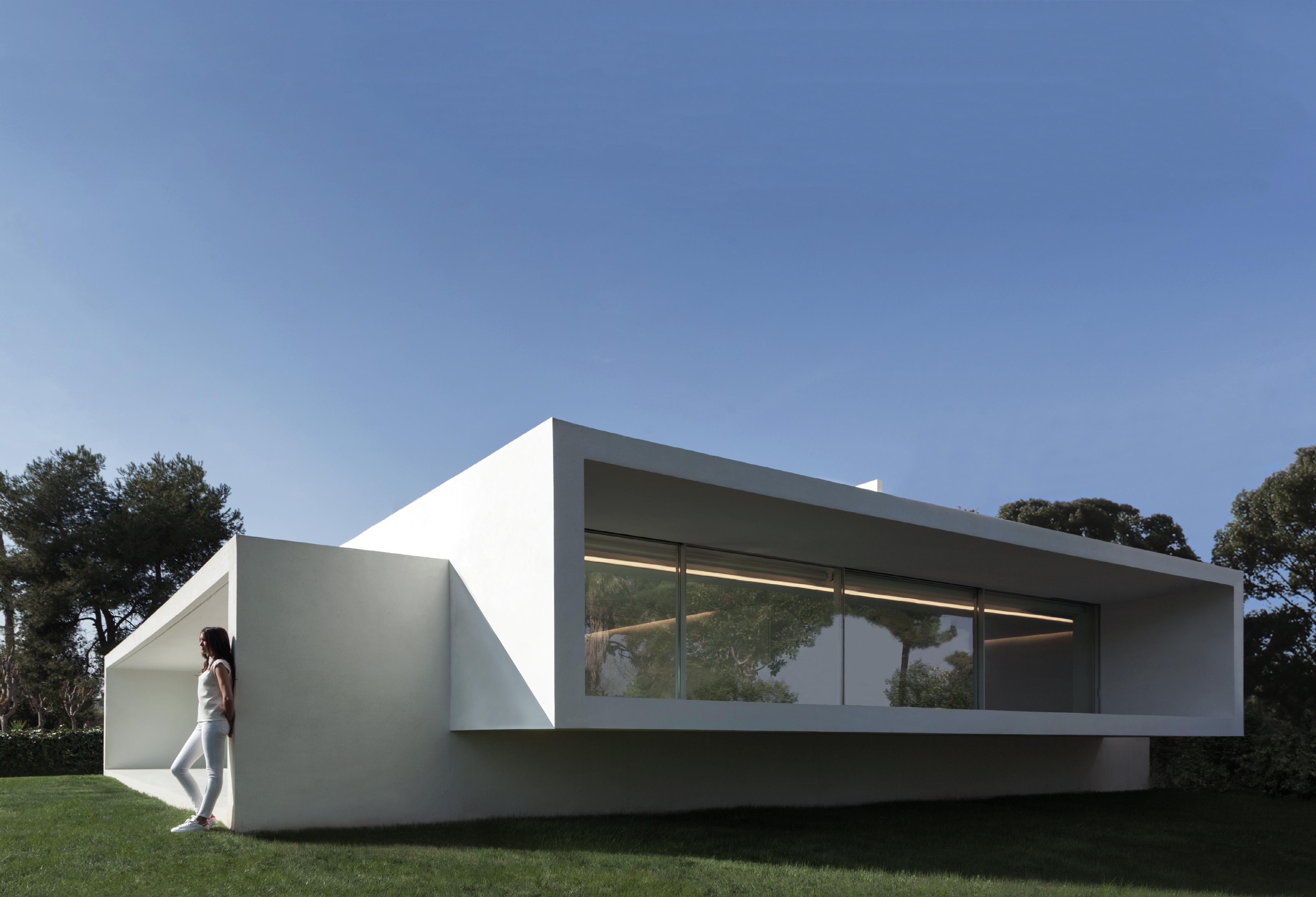 Проекты fran Silvestre arquitectos. Дом на склоне fran Silvestre. Fran Silvestre arquitectos проекты домов. Дом Минимализм.