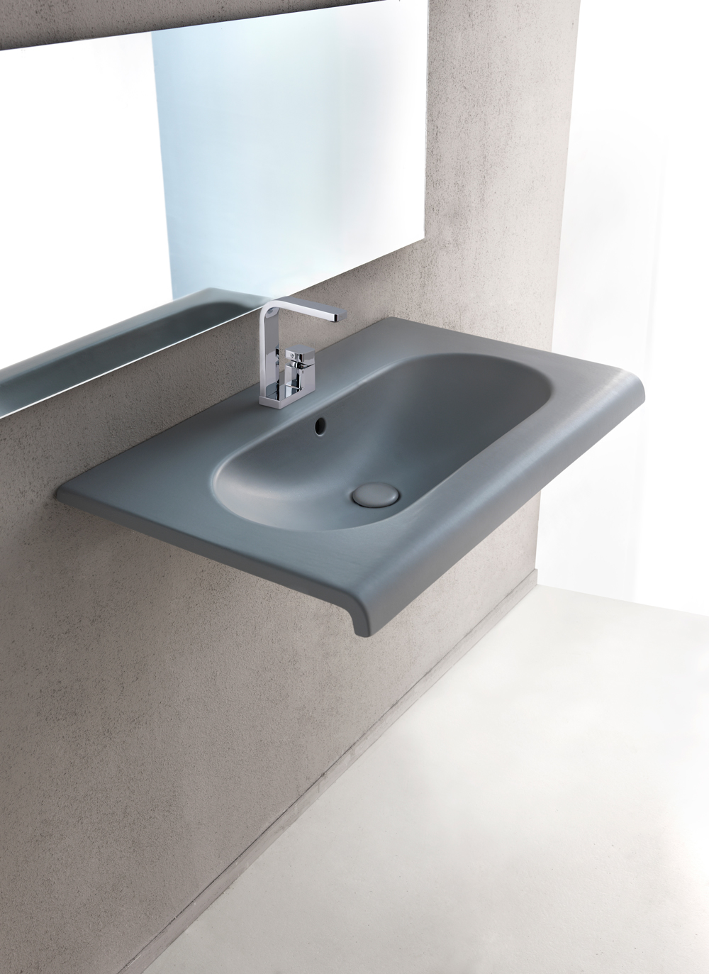 FLUID washbasin, design by Marco Piva