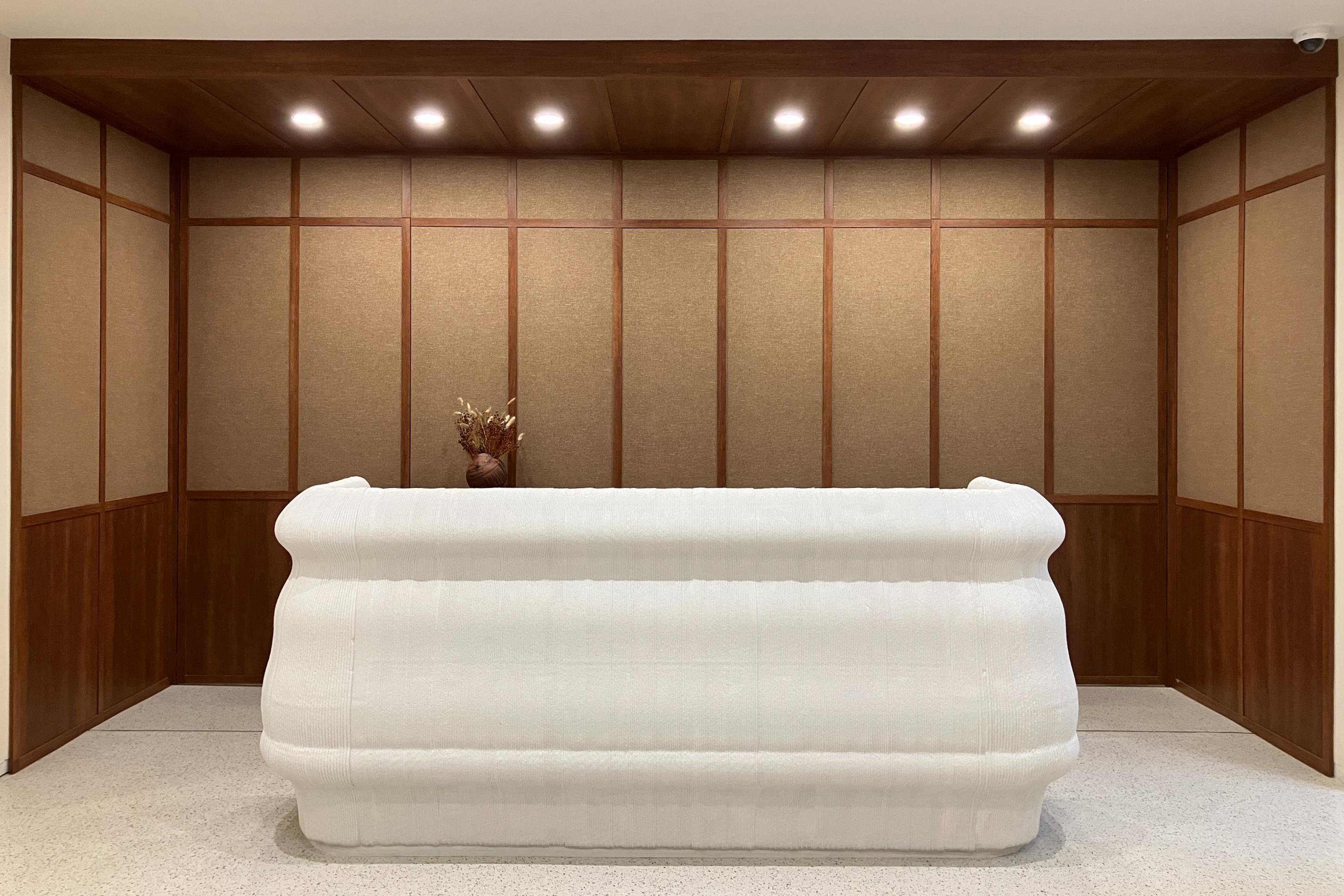3D printed concrete frontdesk at atelier 1618