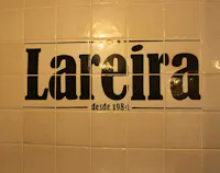 Lareiras Nova Era logo