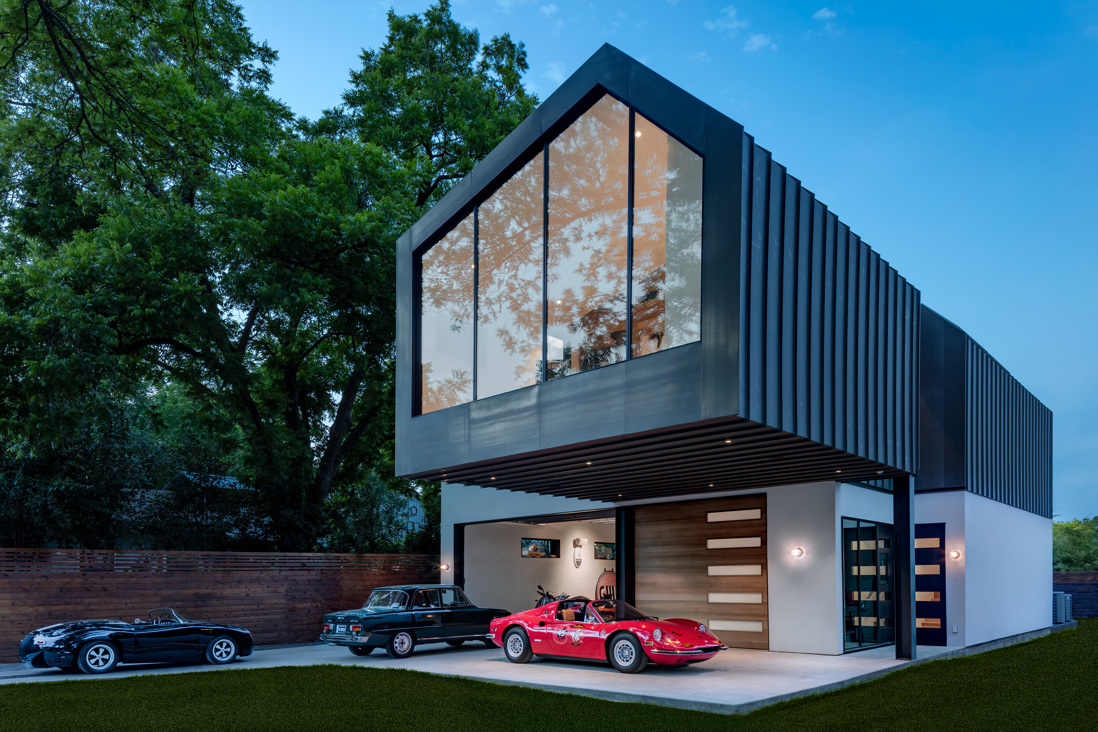 Машино дома. Современные гаражи для автомобилей. Необычный гараж. Дом с гаражом. Дизайнерские здания.