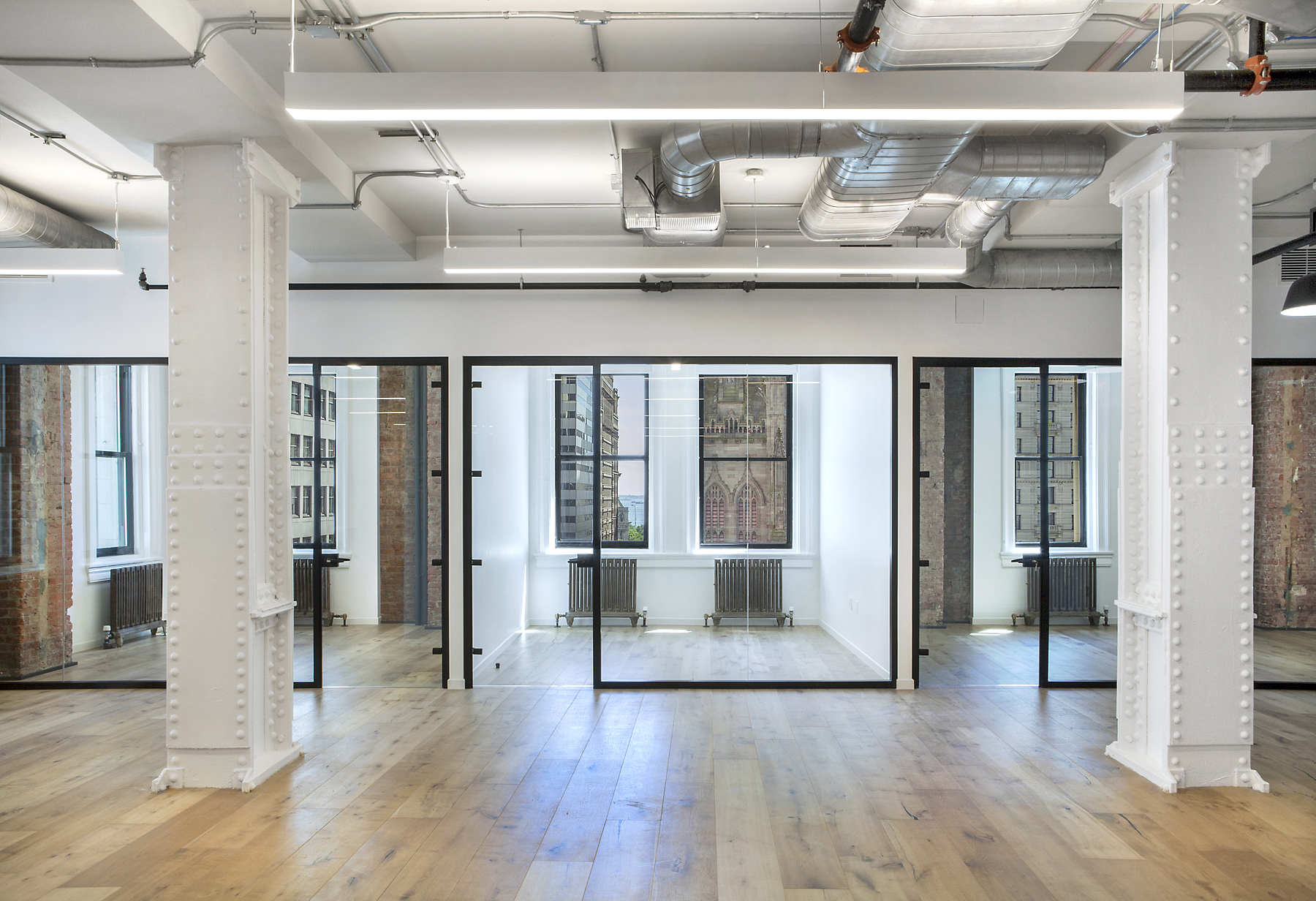 524 West 19th Street Metal Shutter Houses by Montroy Andersen DeMarco