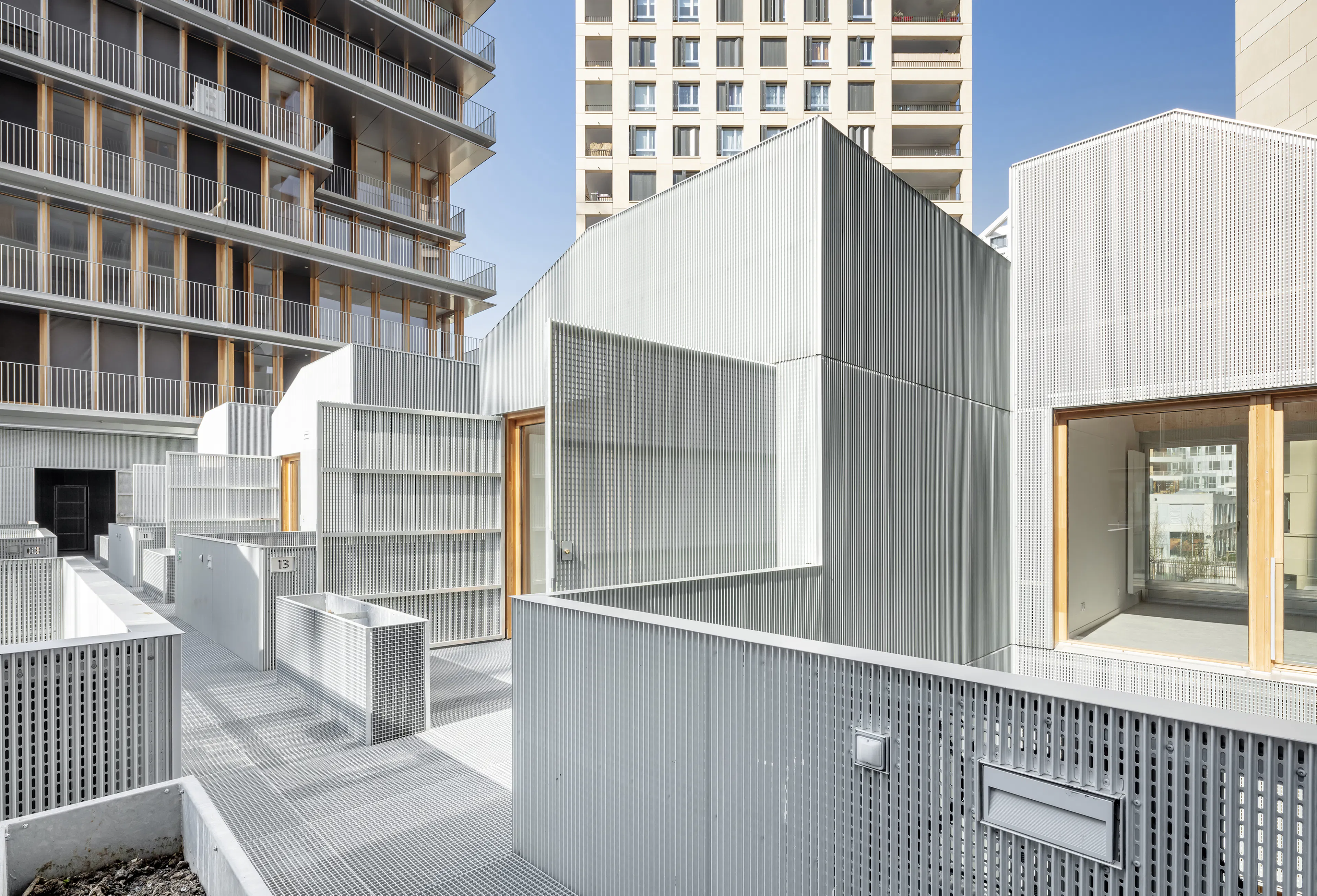 105 Social Dwellings + 18 SOHOs — 2