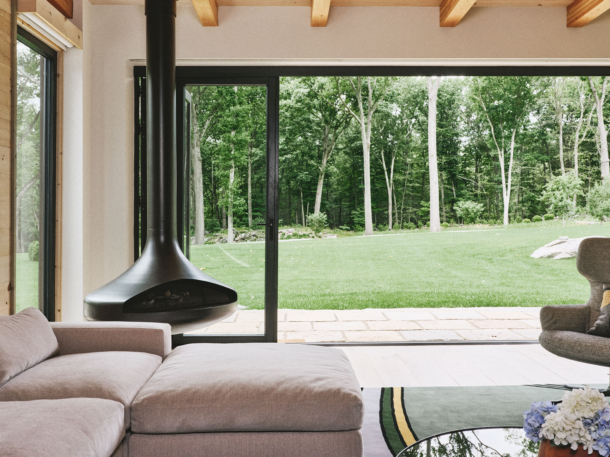 Interior of nineteenth century barn showing adaptive reuse in rural architecture by SPG Architects.