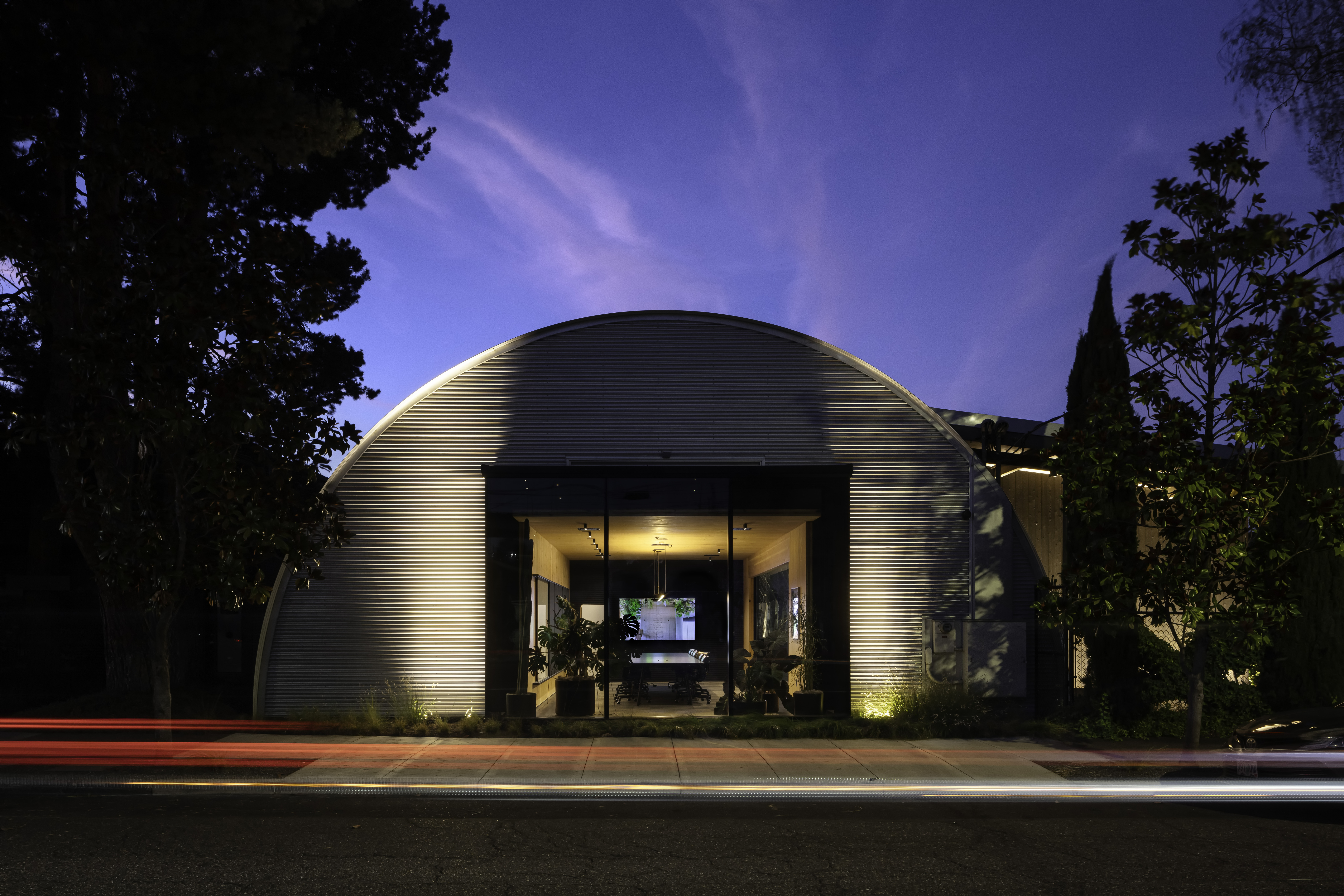 Exterior of Skylab HQ in Portland showing adaptive reuse of industrial steel warehouse buildings.