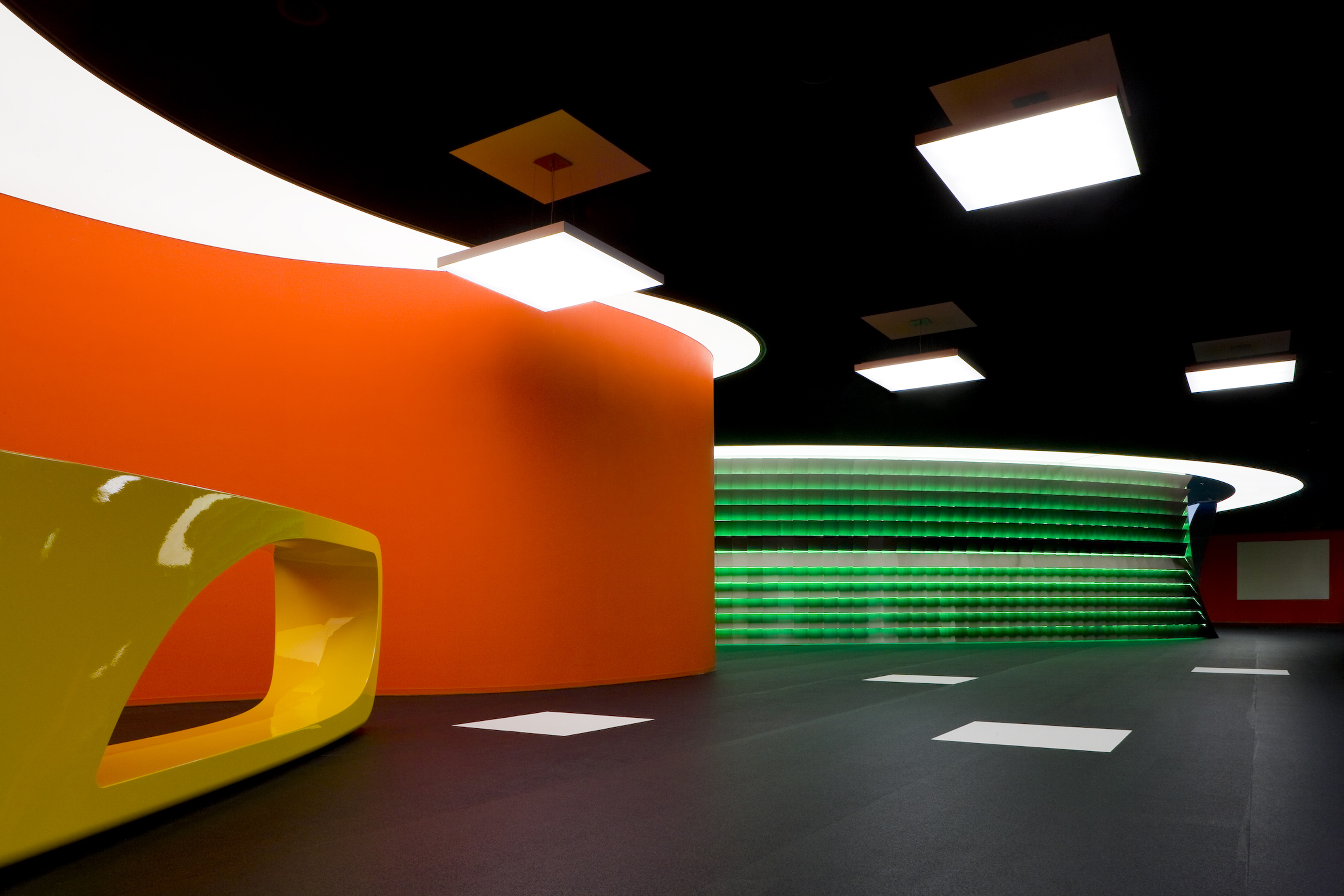 Entrance of Media Plaza with custom made interior in soft sinious lines - © Liong Lie Architects